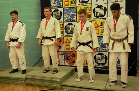 Edgar collecting his first silver medal